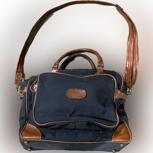Vintage Overnight Bag canvas with leather trim navy and leather 17” x 11”